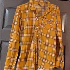 yellow button up shirt